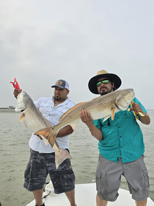 Two people fishing in TX