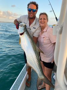 Two people fishing for a tarpon in Point Comfort