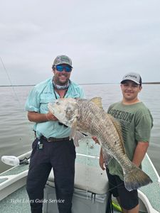 Large black drum fish caught fishing in Point Comfort TX