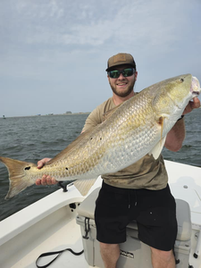 A person fishing at Point Comfort