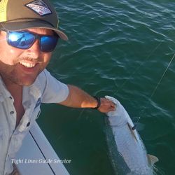 Two people fishing in Point Comfort
