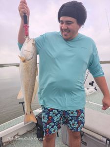 Redfish caught fishing in Point Comfort TX waters held up on boat