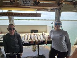 Fresh caught redfish displayed on fishing boat cleaning station at Point Comfort TX