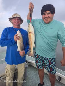 Two redfish caught during fishing trip in Point Comfort TX