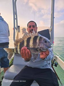 Sheepshead fish with distinctive black stripes caught while fishing in Point Comfort TX