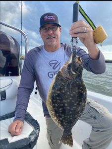 Southern flounder caught fishing in Port Arthur TX waters displayed on boat deck