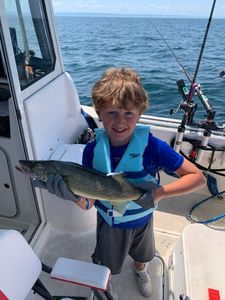 Angler with a single American Yellow Perch in NY