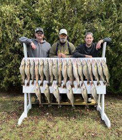 14 fishing poles with 3 people in OH catching a great catch