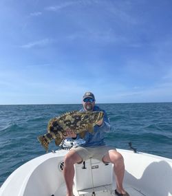 One fisherman catching a big 23-inch fish in Bradenton