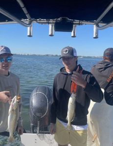 Two anglers fishing in Florida waters