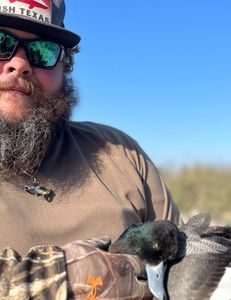 Lone angler fishing and hunting in Corpus Christi