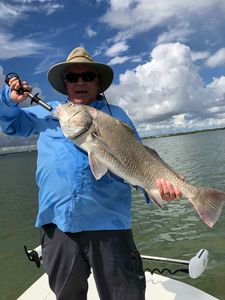 Lone fisherman in TX enjoying great day of fishing and hunting