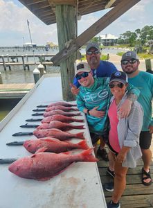 4 people fishing in Alabama