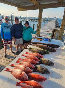 3 anglers fishing in the calm waters of Gulf Shores