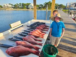 Two people fishing in Gulf Shores
