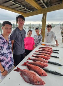 5 people fishing in Gulf Shores