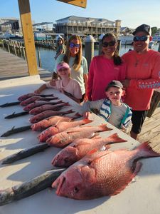 Group of people fishing at Gulf Shores