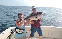 Two people fishing at Gulf Shores