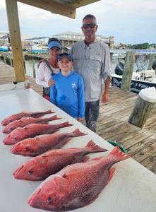 3 people fishing in Gulf Shores