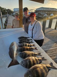 Successful sheepshead and redfish catch displayed on boat dock in Gulf Shores Alabama