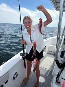 Red snapper catch displayed on fishing boat in Orange Beach Alabama