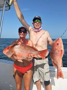 Two red snapper caught fishing in Orange Beach AL on charter boat