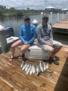 Two people fishing in MS