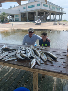 Two anglers fishing in Pass Christian