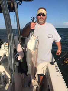 Angler with a 25-inch fish in FL