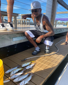 Fisherman with 2 fish in Florida