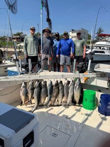 Five Chinook Salmon, Great Barracuda, and Spotted Weakfish caught fishing in WI