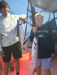 Two people fishing in Kenosha