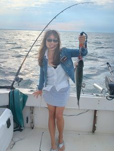 Angler holding a fish in Kenosha
