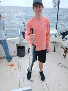 Catch of the day: a vibrant pink salmon fishing in WI