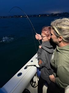 Two anglers fishing at Wells Harbor