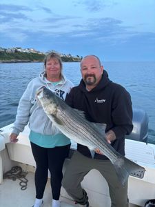 Striped bass fishing in Wells Harbor