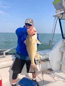 Fishing enthusiast enjoying their hobby in OH