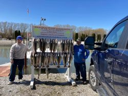 Two anglers enjoying a fishing trip in Oak Harbor