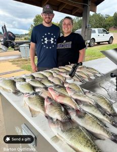 Two people fishing in Batesville