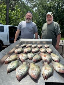 Two people fishing in MS