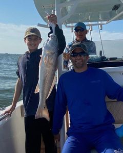 A group of 3 people fishing in South Carolina
