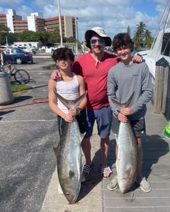Two African Pompano fish, each measuring 70 inches, caught while fishing in Pompano Beach