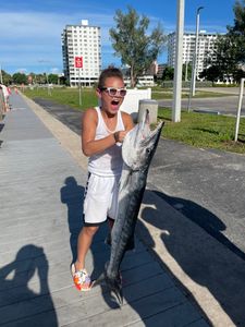 Angler with a 38-inch fish catches their prize in FL