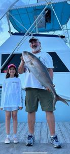 Two people fishing at Pompano Beach