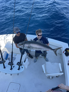 Reeling in a big catch out on the open water!