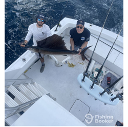 Reeling in the big one on the open seas.