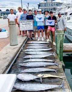 Fishing charter catch display of wahoo and blackfin tuna on dock in Morehead City NC