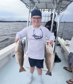 Two redfish caught during a fishing trip in North Carolina