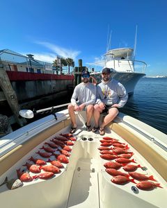 Two people enjoying a day of fishing in Panama City Beach