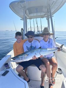 Photo of a king mackerel fish caught by 3 people fishing in Panama City Beach